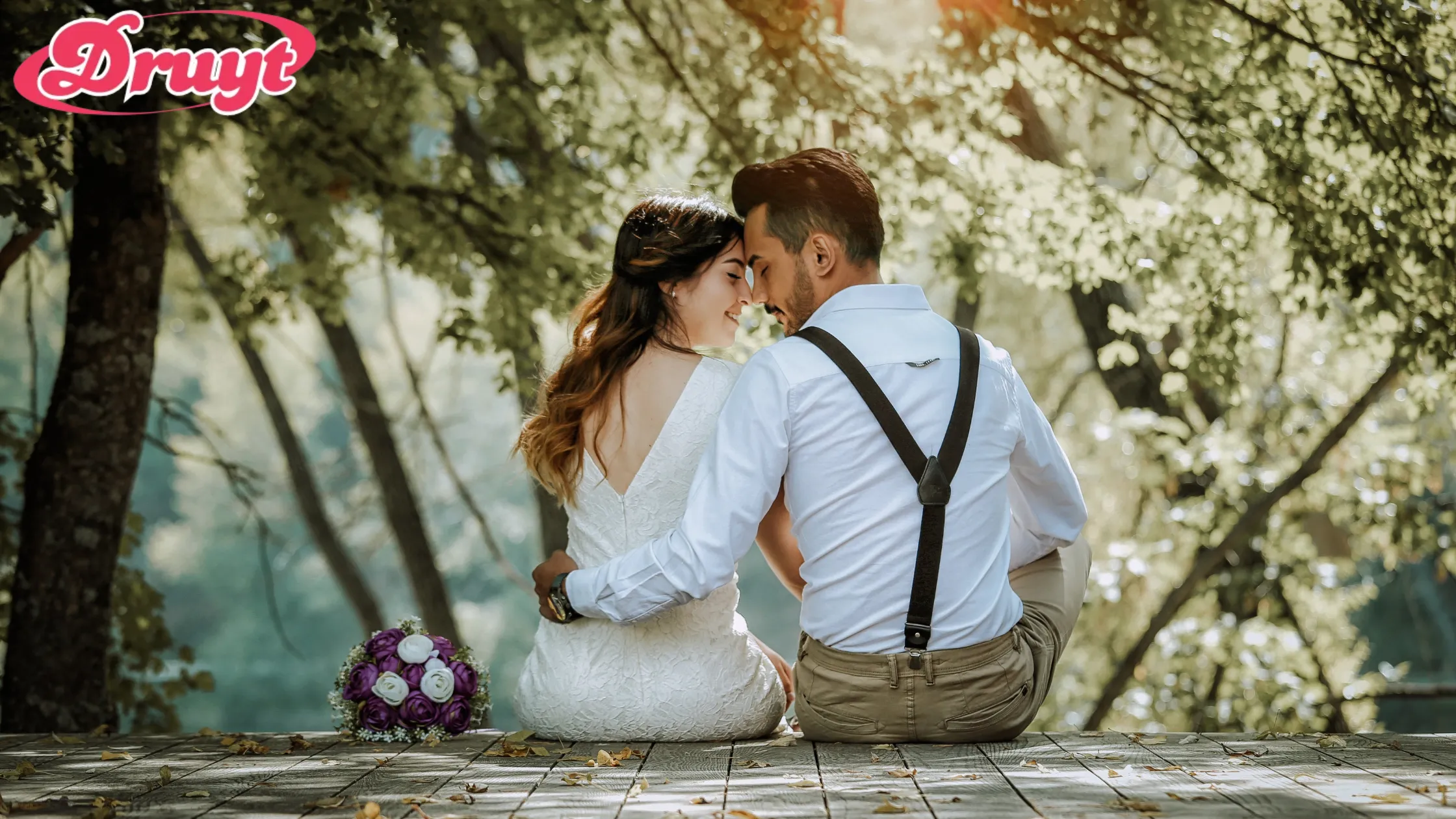 A newlywed couple sitting on a wooden platform, sharing a quiet moment together in a forest. Can you get invited to a wedding? Close friends and family are usually prioritized for invites.